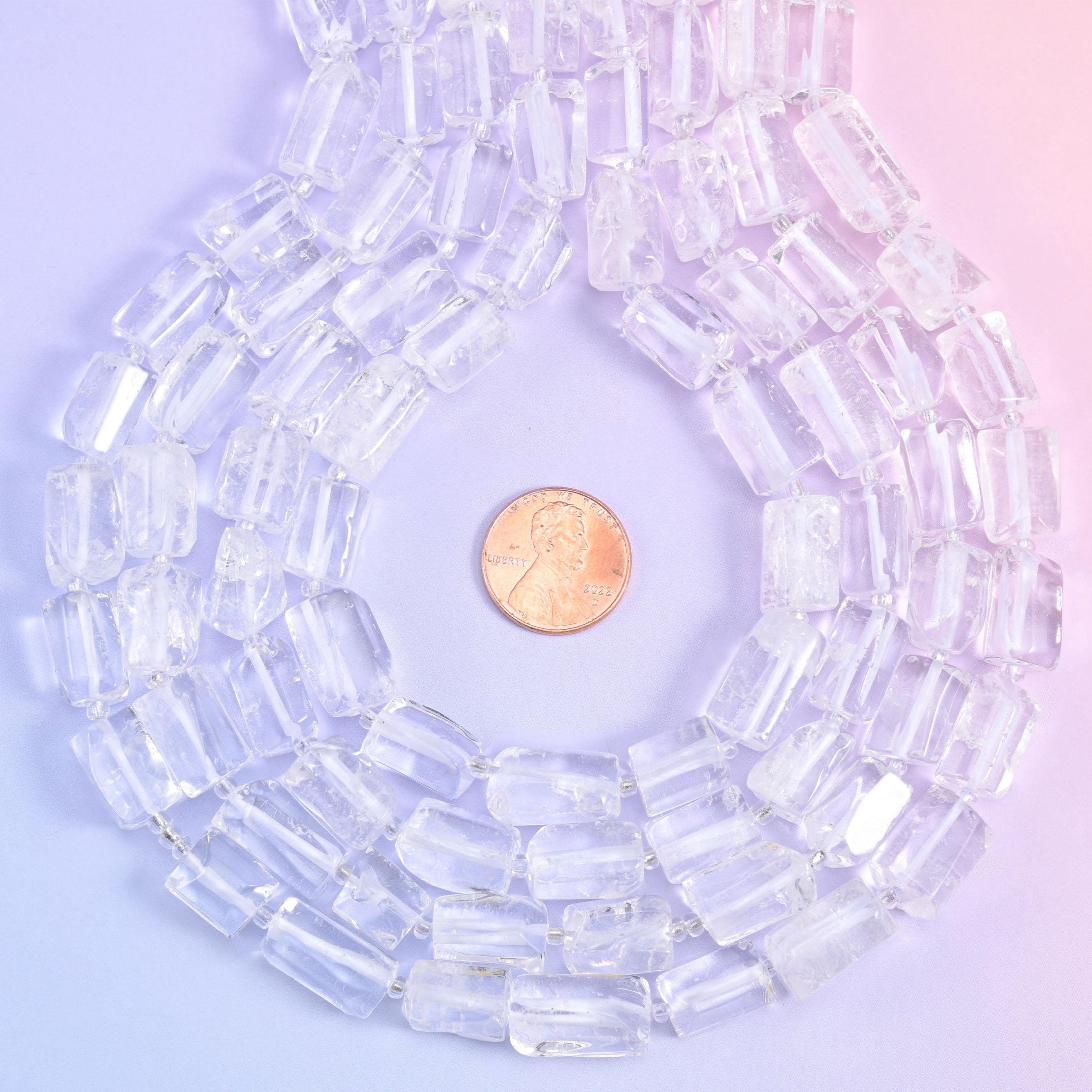 Coiled strands with a penny centred inside, a quick way to judge tube width before ordering