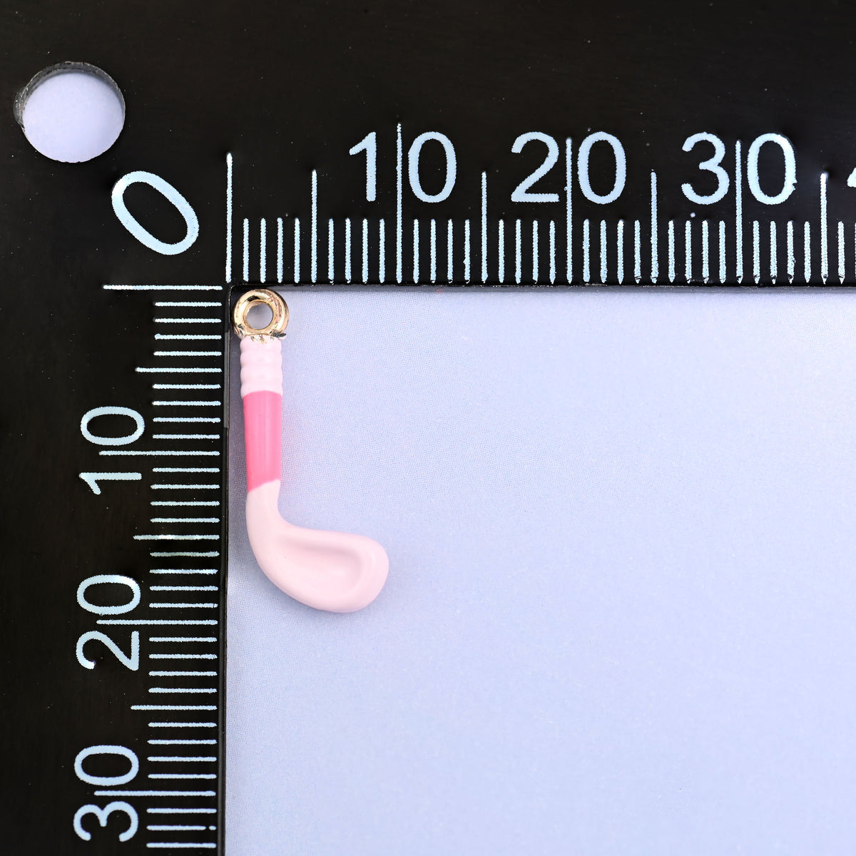 Light pink golf club charm measured at 20 x 8mm including the small ring.