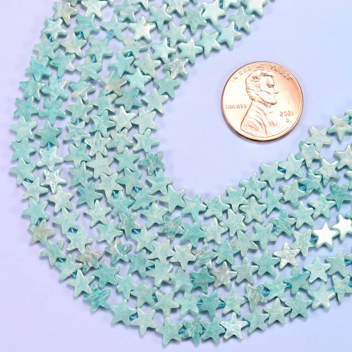Flat five-pointed star cut blue amazonite beads