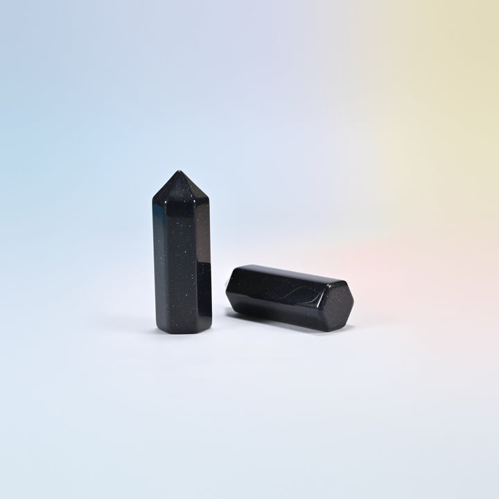 Blue sandstone hexagon points, navy with blue and gold sparkle, man-made glass, standing and lying down