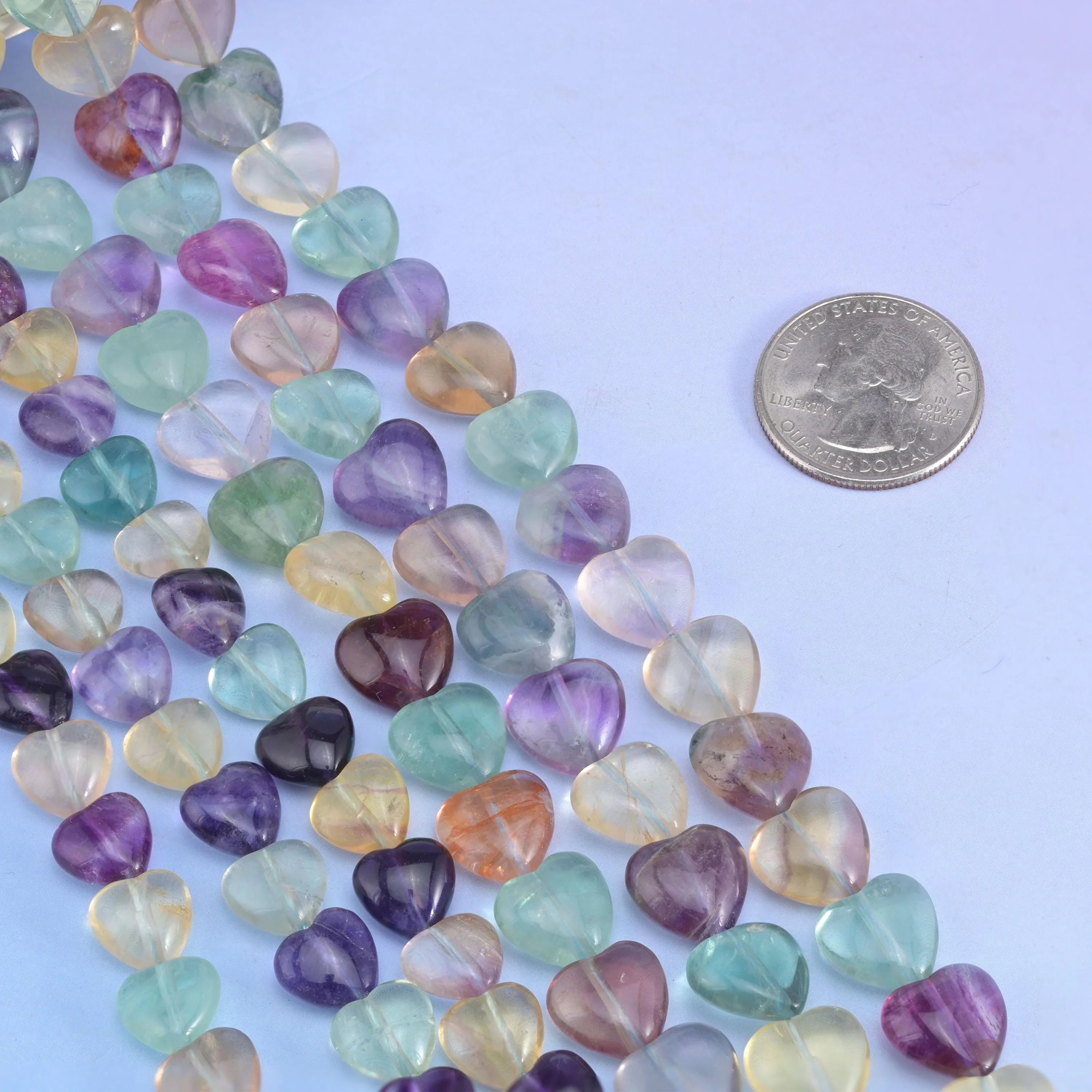 Puffed heart cut Rainbow Fluorite beads for jewelry making.