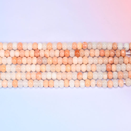 Natural Pink Aventurine Rondelle Beads in soft blush, peach and creamy white tones.