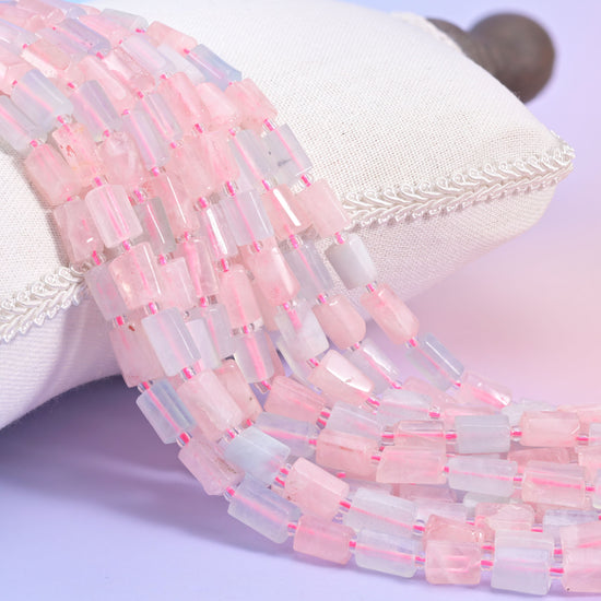 Natural Multi-Color Morganite faceted tube beads in delicate pastel pink and blue.