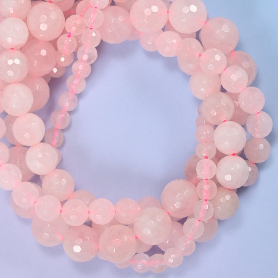 Pink rose quartz faceted round beads in 6mm, 8mm, 10mm, and 12mm, 15-inch strand, for jewelry making.