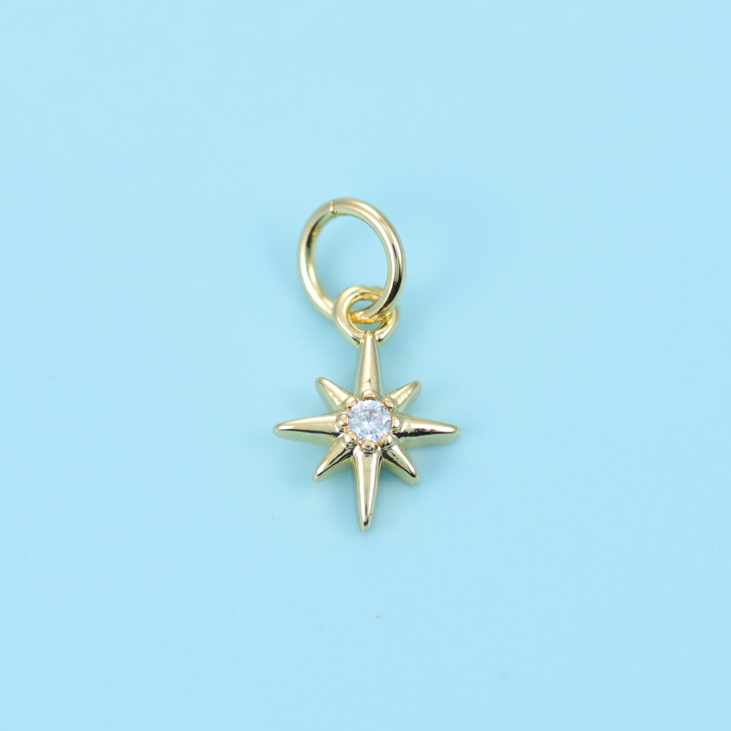 Brass, 18K gold filled, set beads, eight-point north star, 10 x 7.24mm