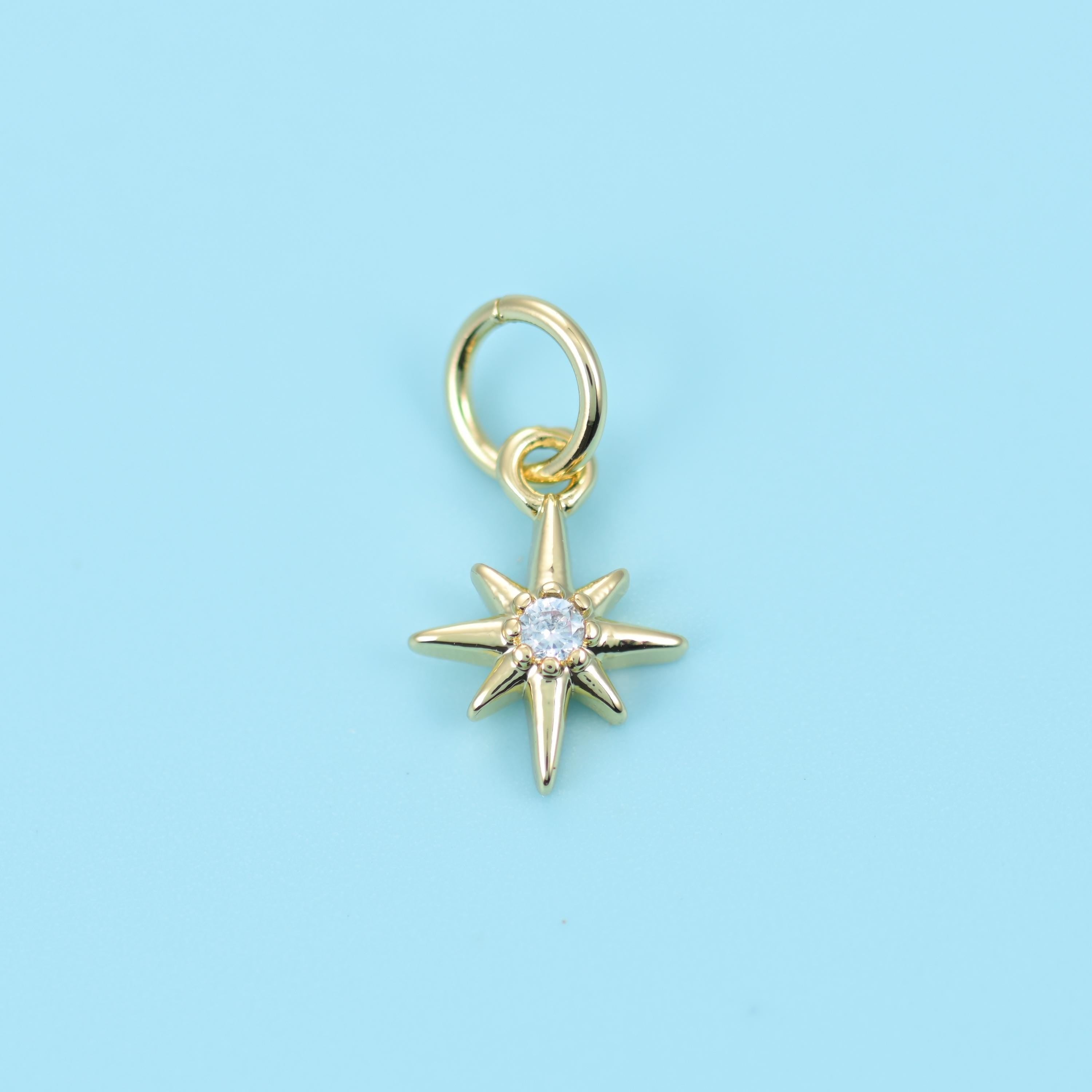 Brass, 18K gold filled, set beads, eight-point north star, 10 x 7.24mm