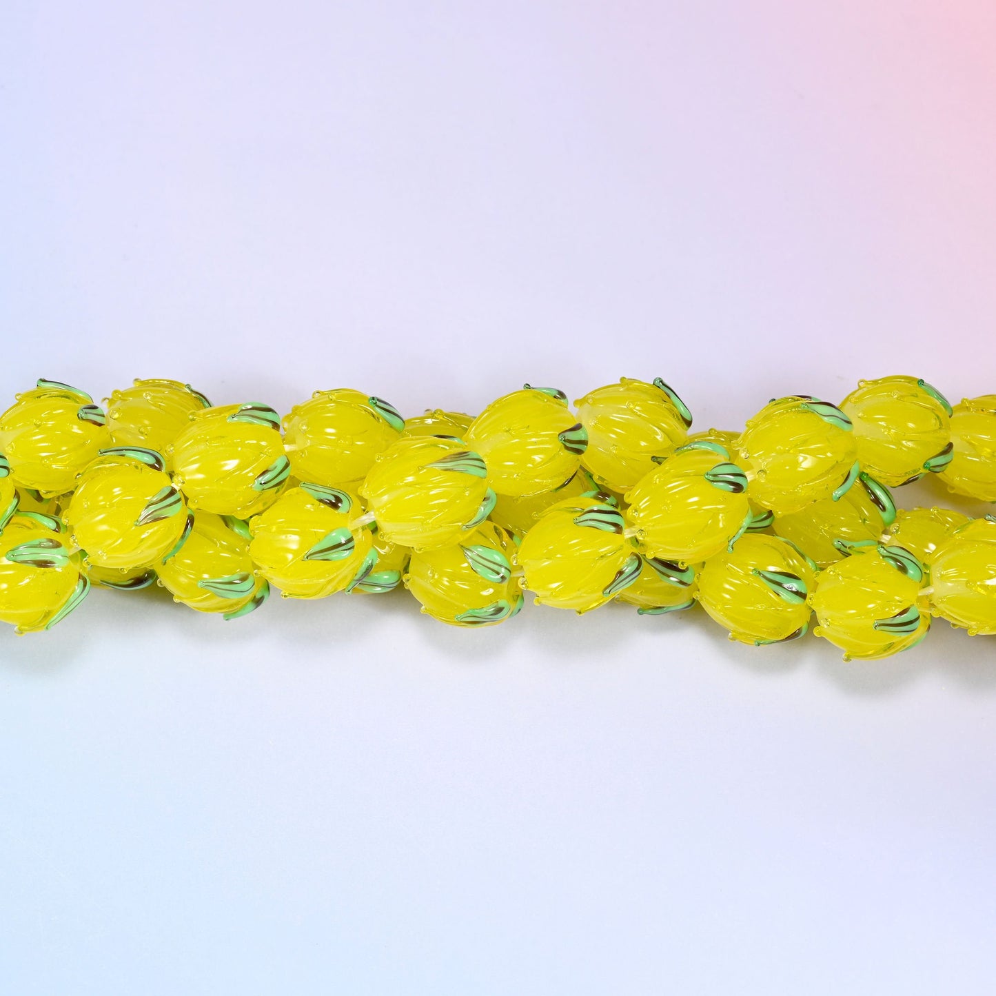 Yellow tulip bud lampwork glass beads for jewelry making, each bead handmade so size varies slightly