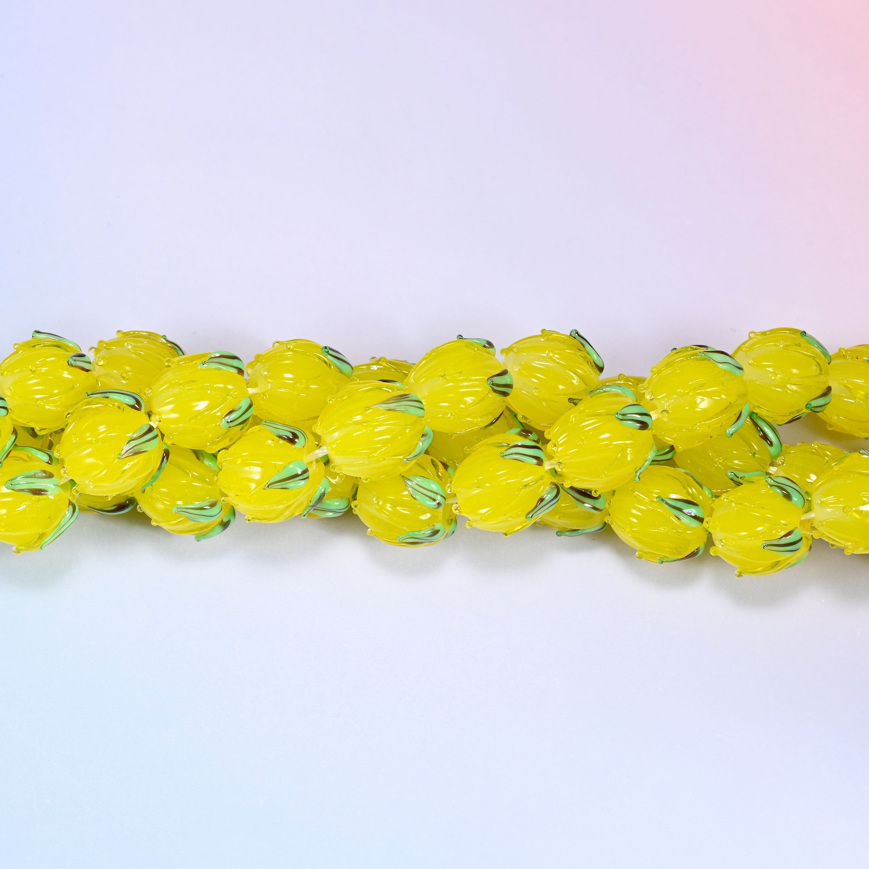 Yellow tulip bud lampwork glass beads for jewelry making, each bead handmade so size varies slightly