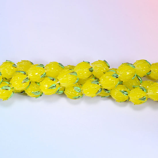 Yellow tulip bud lampwork glass beads for jewelry making, each bead handmade so size varies slightly