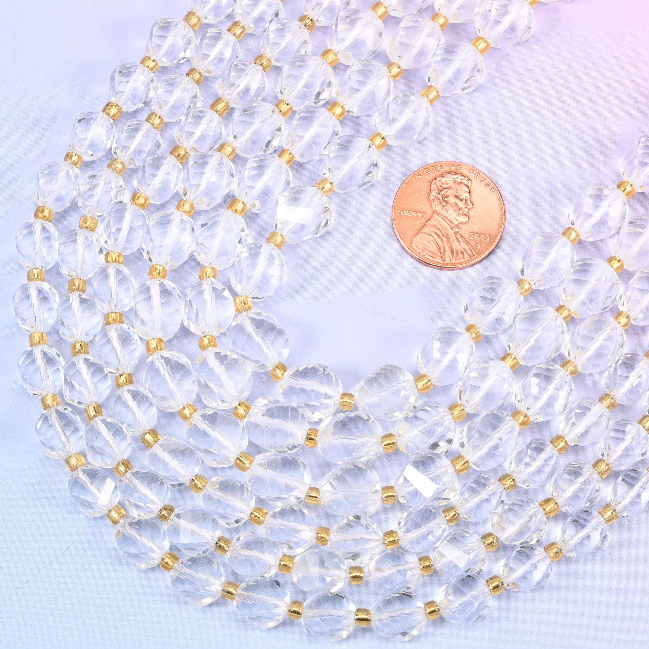 Faceted spiral twist cut clear quartz beads