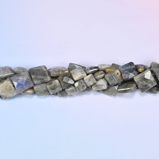 Gray Labradorite faceted flat square beads in a single close run, the flat front of each tile catching the light