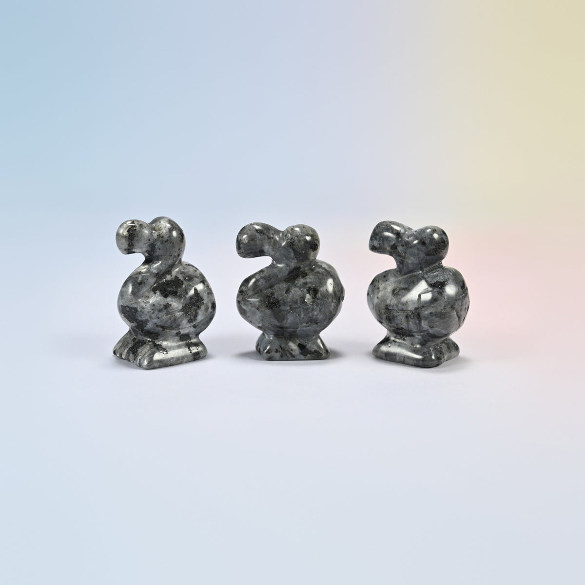 Three black labradorite dodo bird crystal carvings, 1.5 inch, dark gray natural stone with blue flash