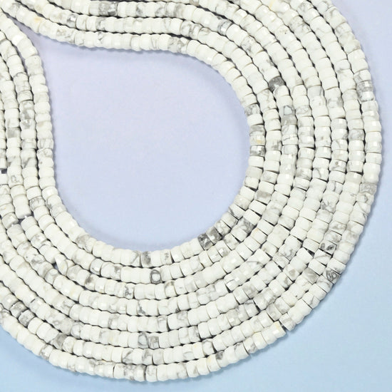 White howlite faceted heishi disc beads curved into an open loop, white and gray beads