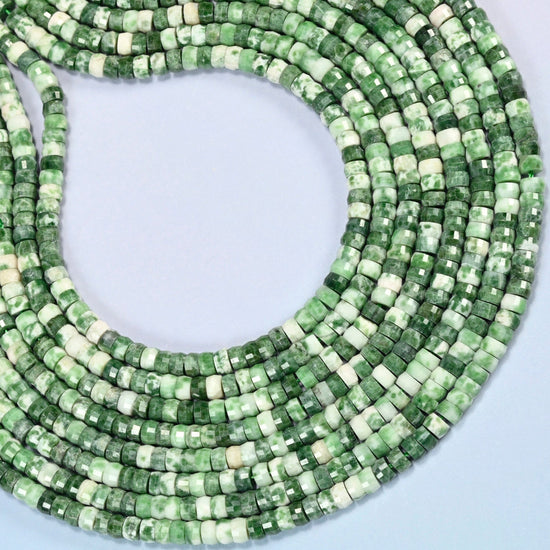 Tree agate faceted heishi disc beads curved into an open loop, green and white beads