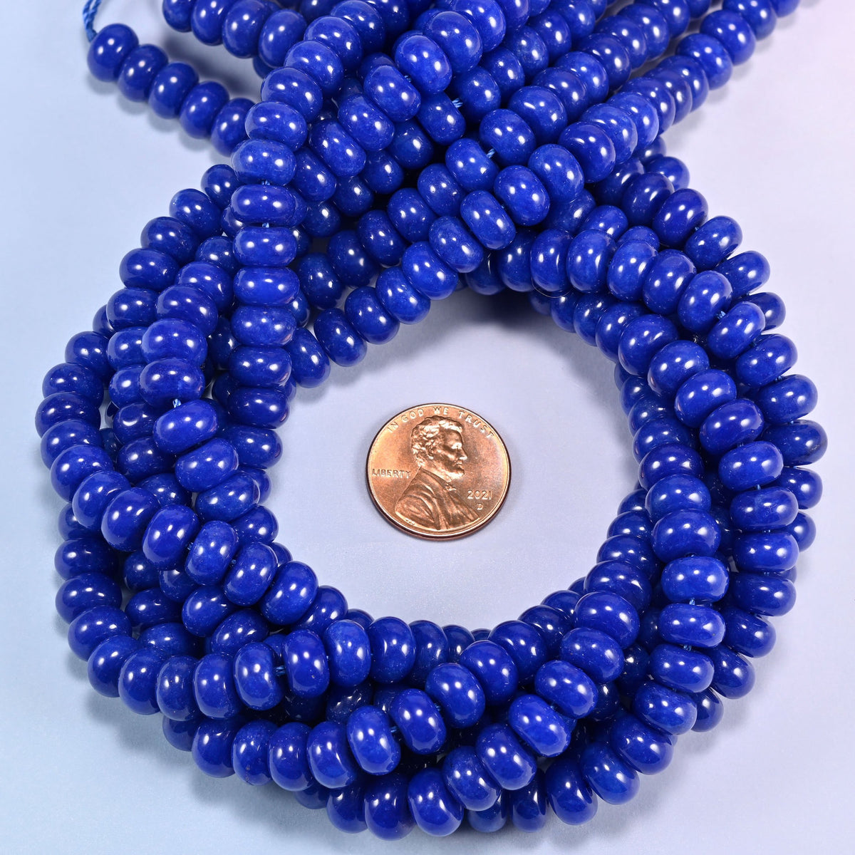Dark Blue dyed jade gemstone rondelle beads coiled flat, 5x8mm smooth discs on a 15 inch strand