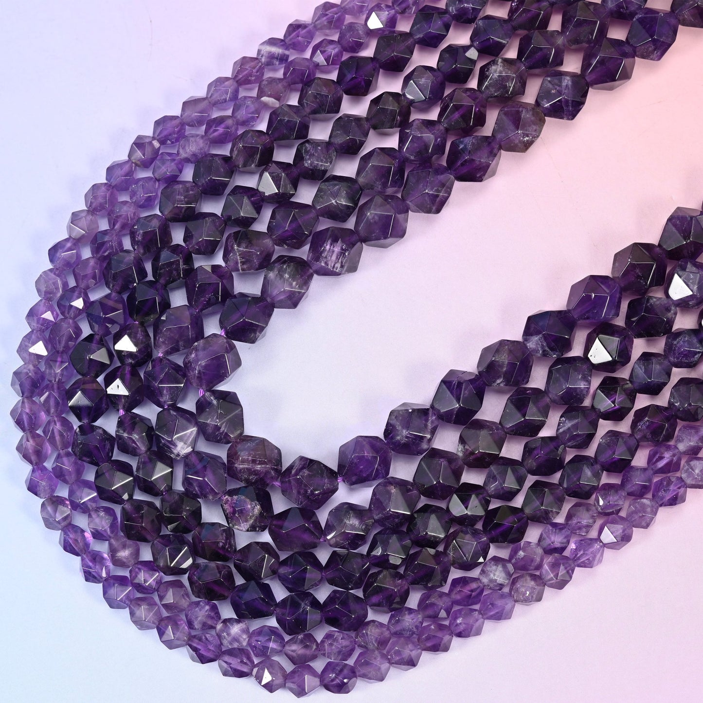 Amethyst diamond star cut beads, 15.5 inch strand.