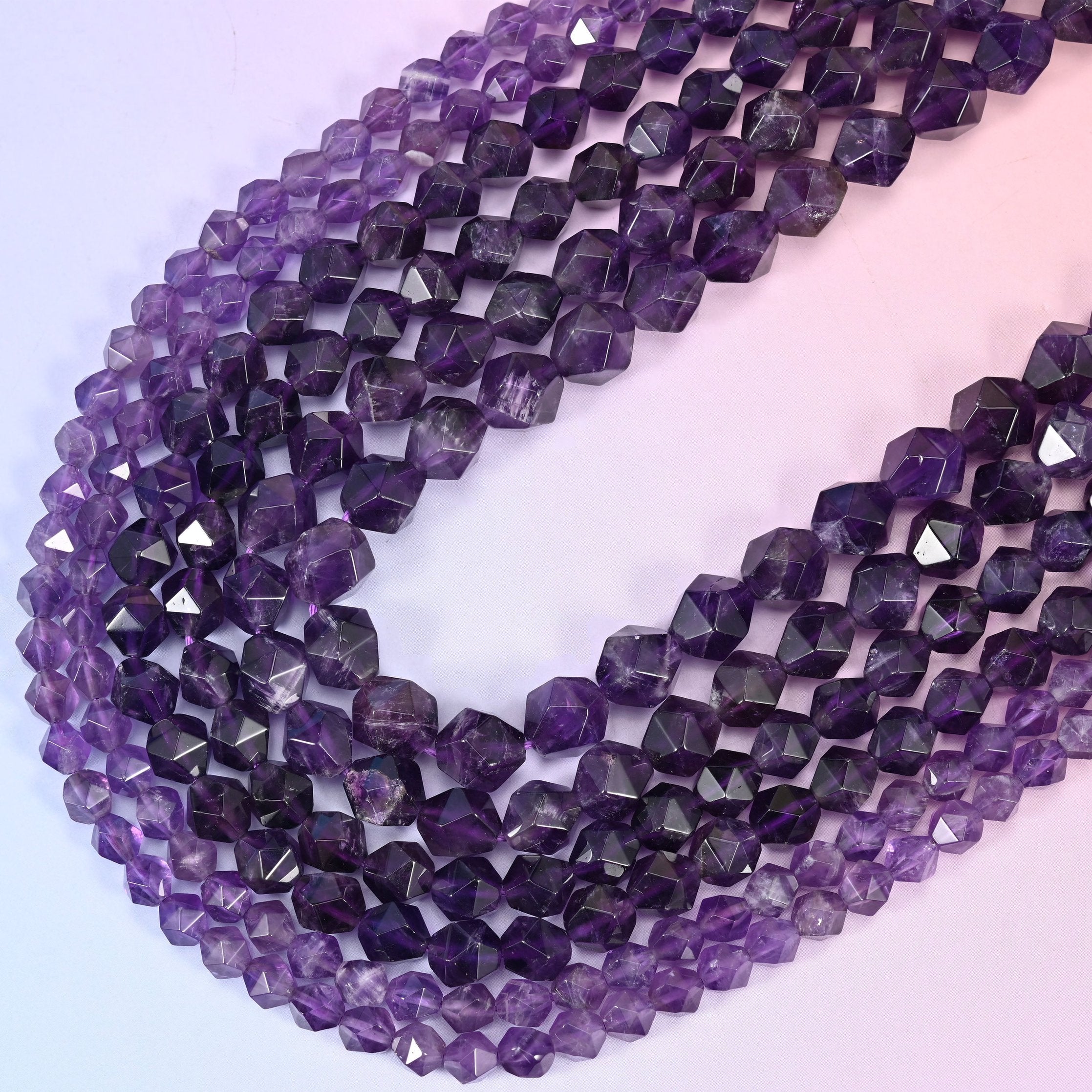 Amethyst diamond star cut beads, 15.5 inch strand.