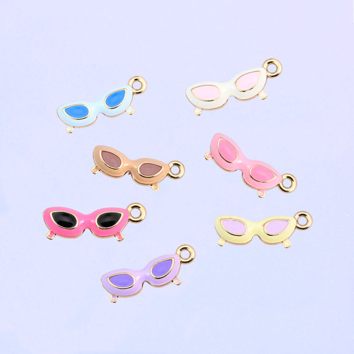 All eight cat eye sunglasses colorways scattered together.