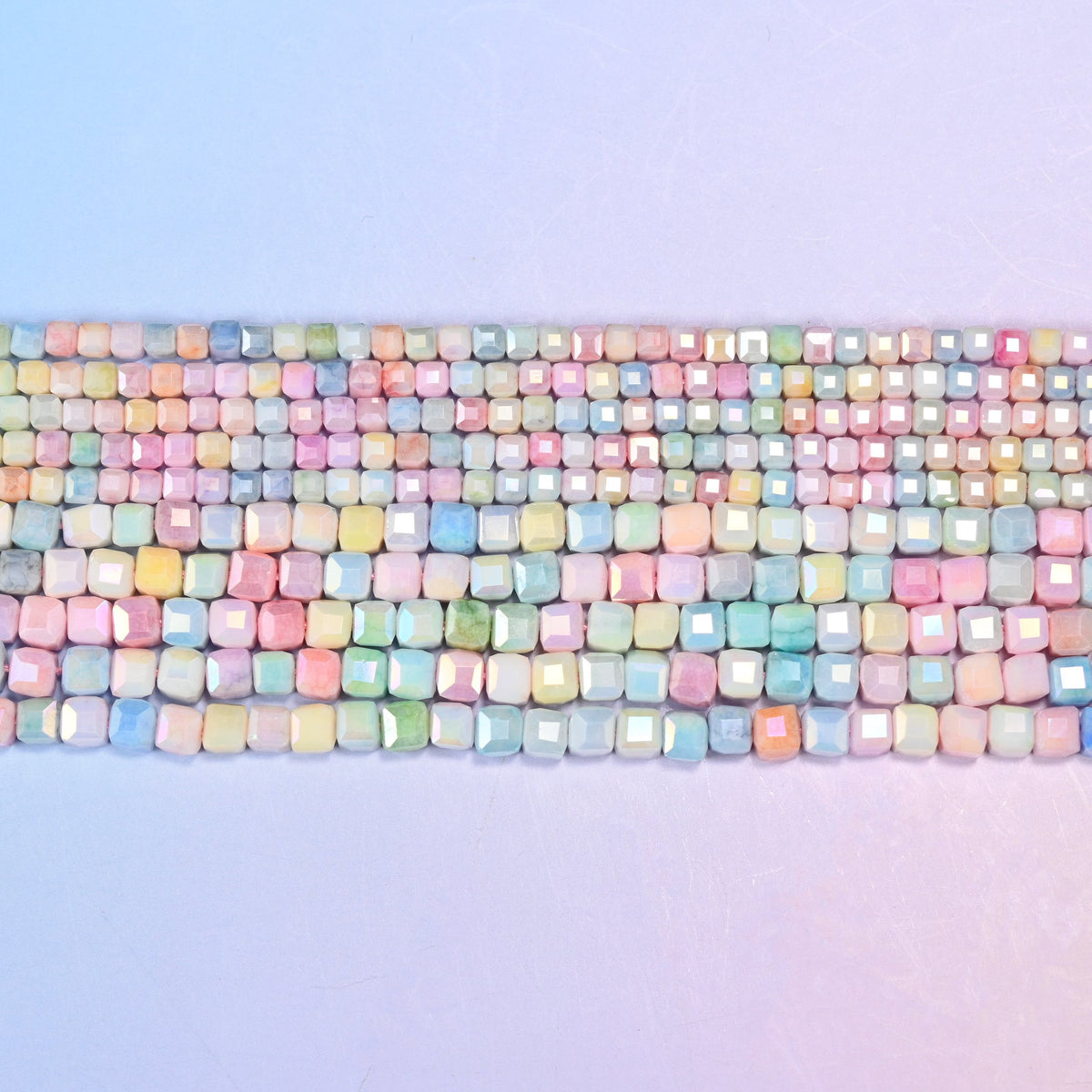 Pastel glass cubes in candy pink, sky blue, butter yellow, mint green, lilac and cream.