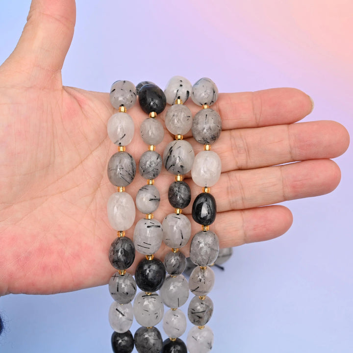 Black Rutilated Quartz beads, oval nugget shape, 10-17mm.