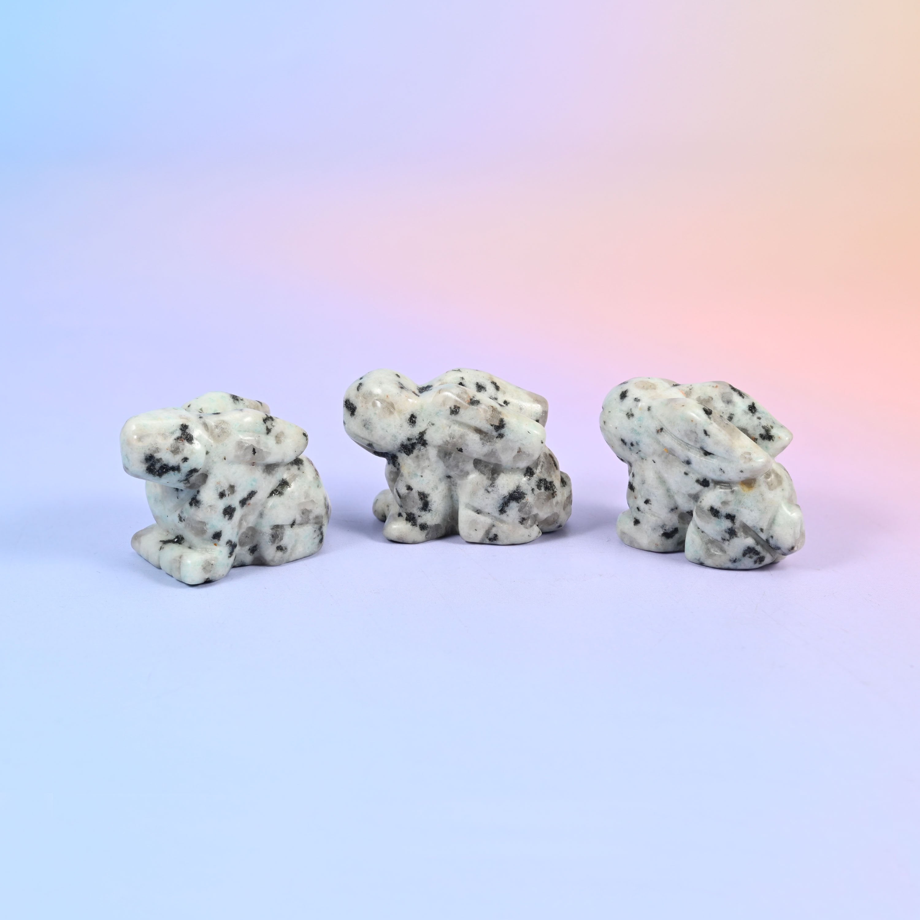 1.5 inch carved stone rabbit figurine, natural stone so veining and colour vary piece to piece