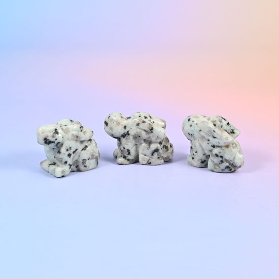 1.5 inch carved stone rabbit figurine, natural stone so veining and colour vary piece to piece