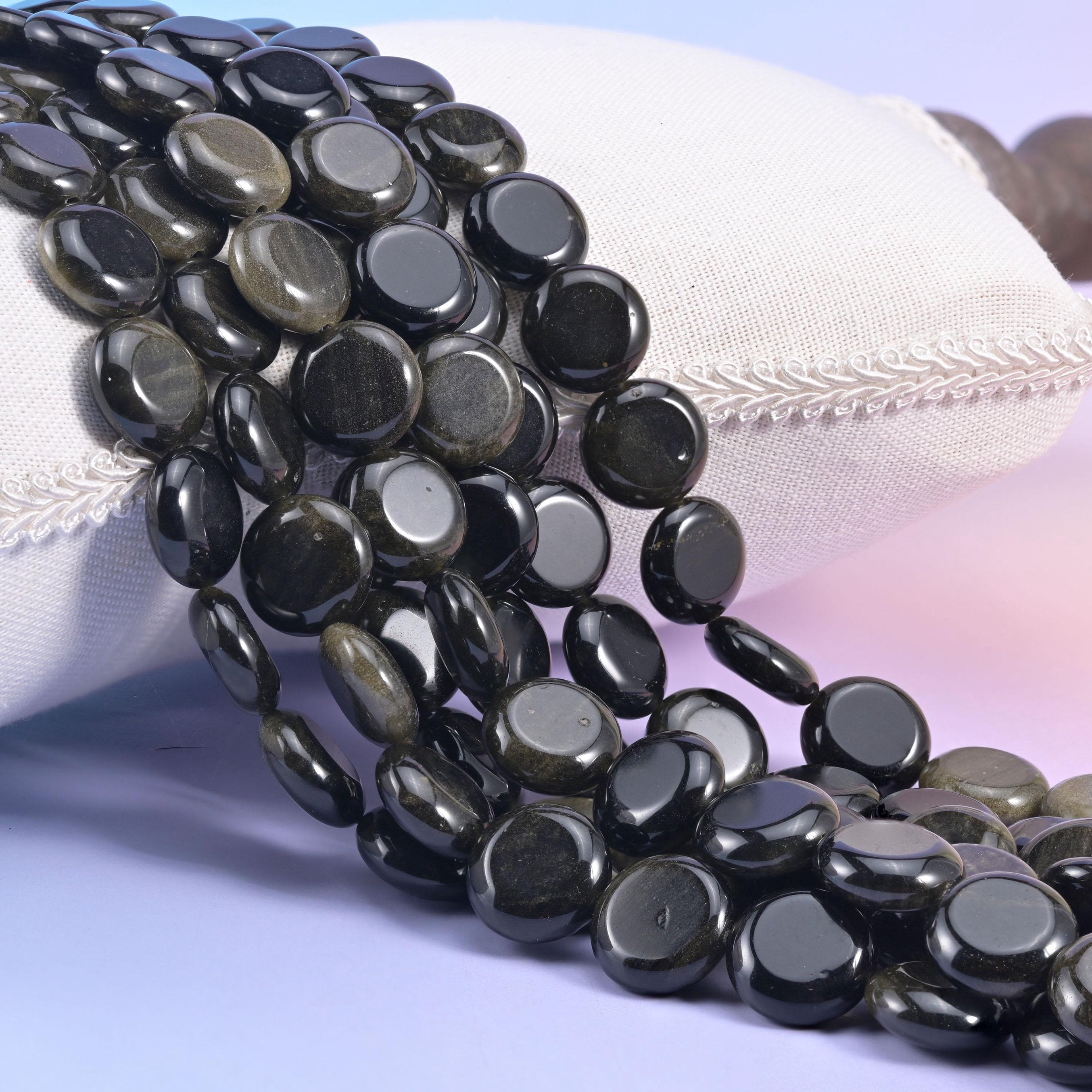 Natural Gold Obsidian smooth coin beads in flat black with a warm bronze-gold shimmer
