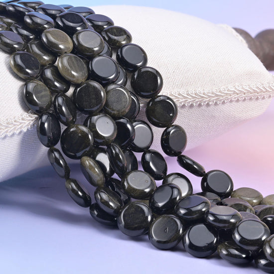 Natural Gold Obsidian smooth coin beads in flat black with a warm bronze-gold shimmer