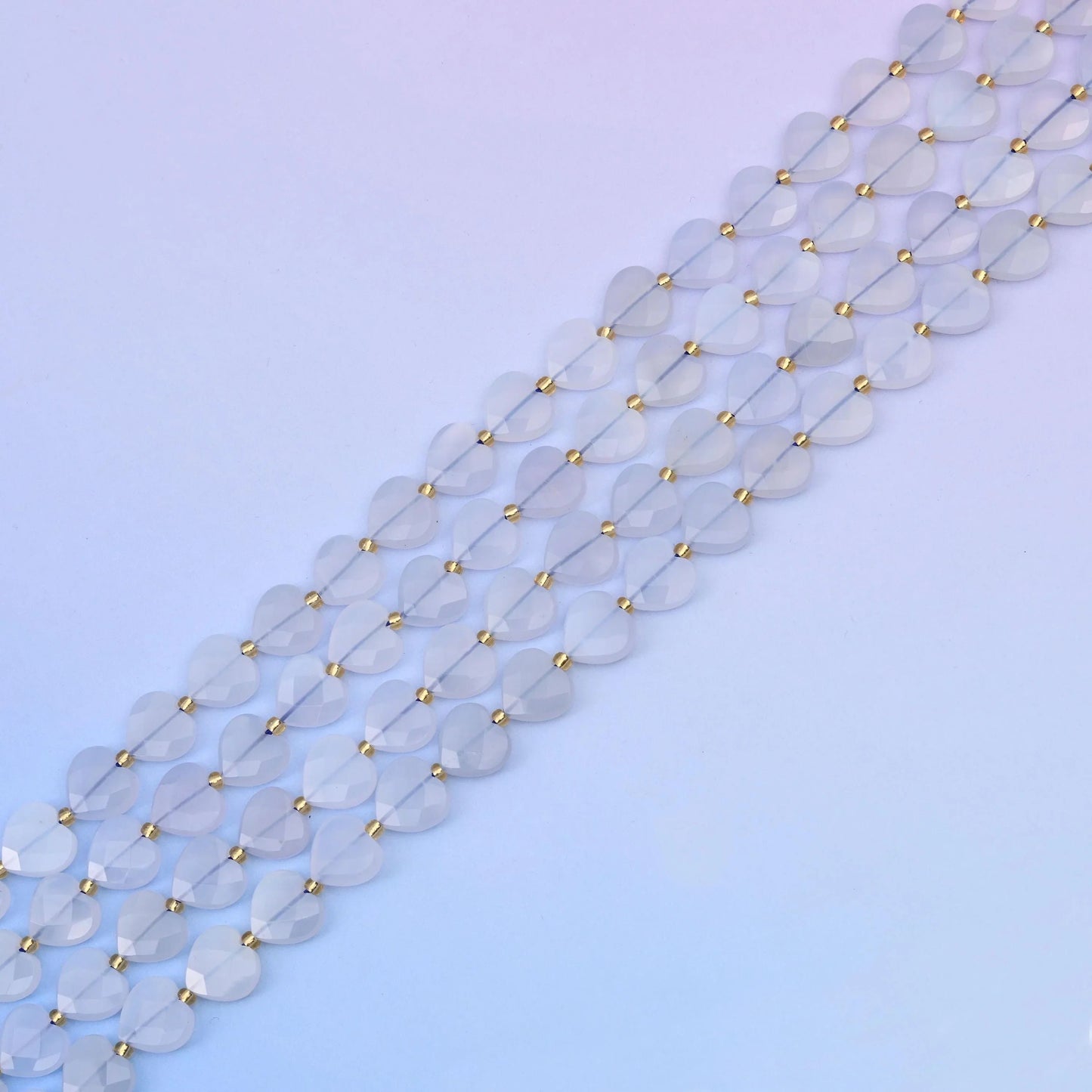 Blue chalcedony beads in icy pale blue with milky glow