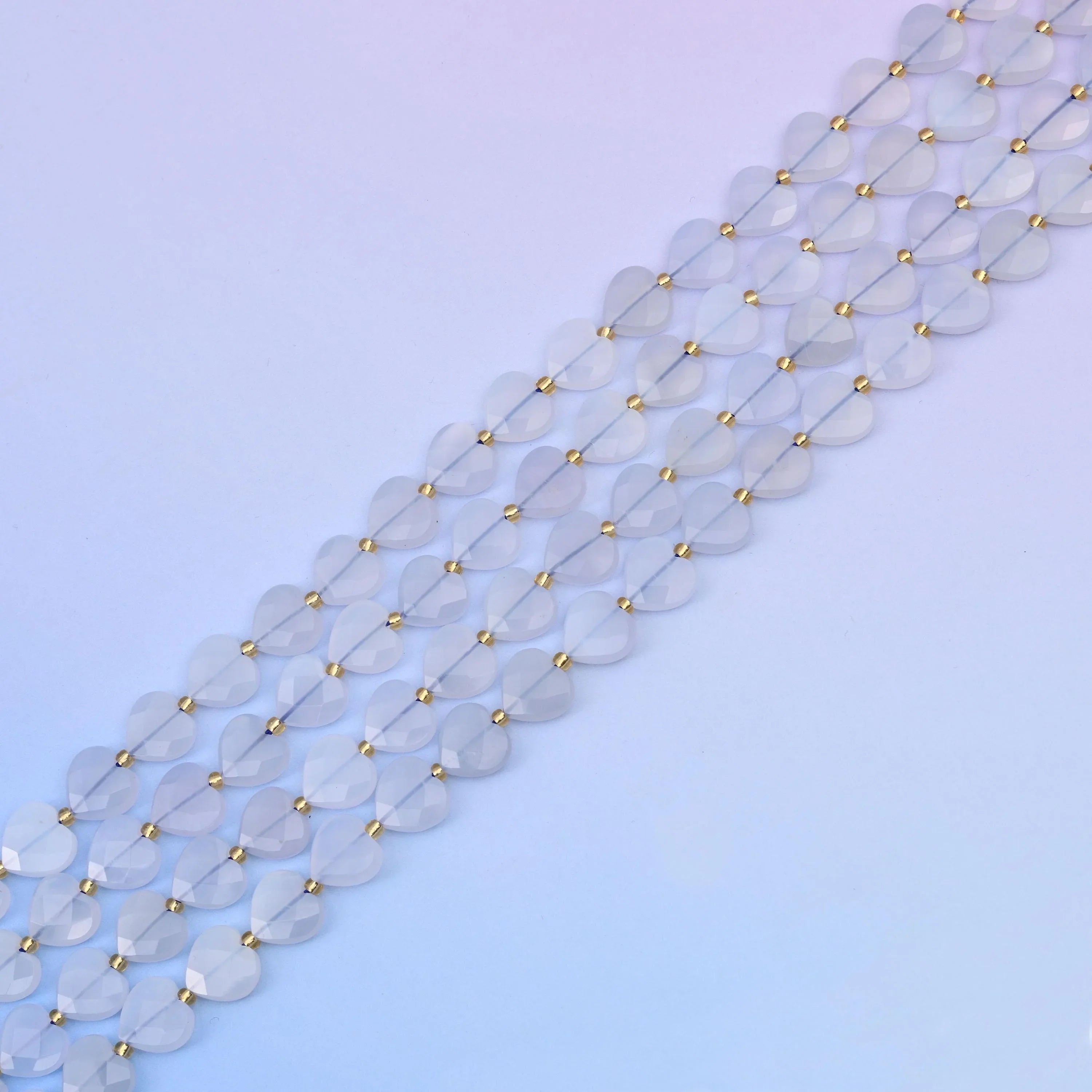 Blue chalcedony beads in icy pale blue with milky glow