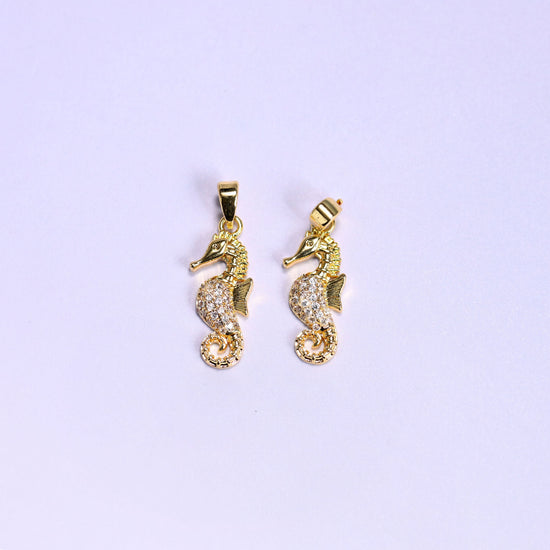Sea Horse Zircon Pendants in warm gold or cool platinum tone
