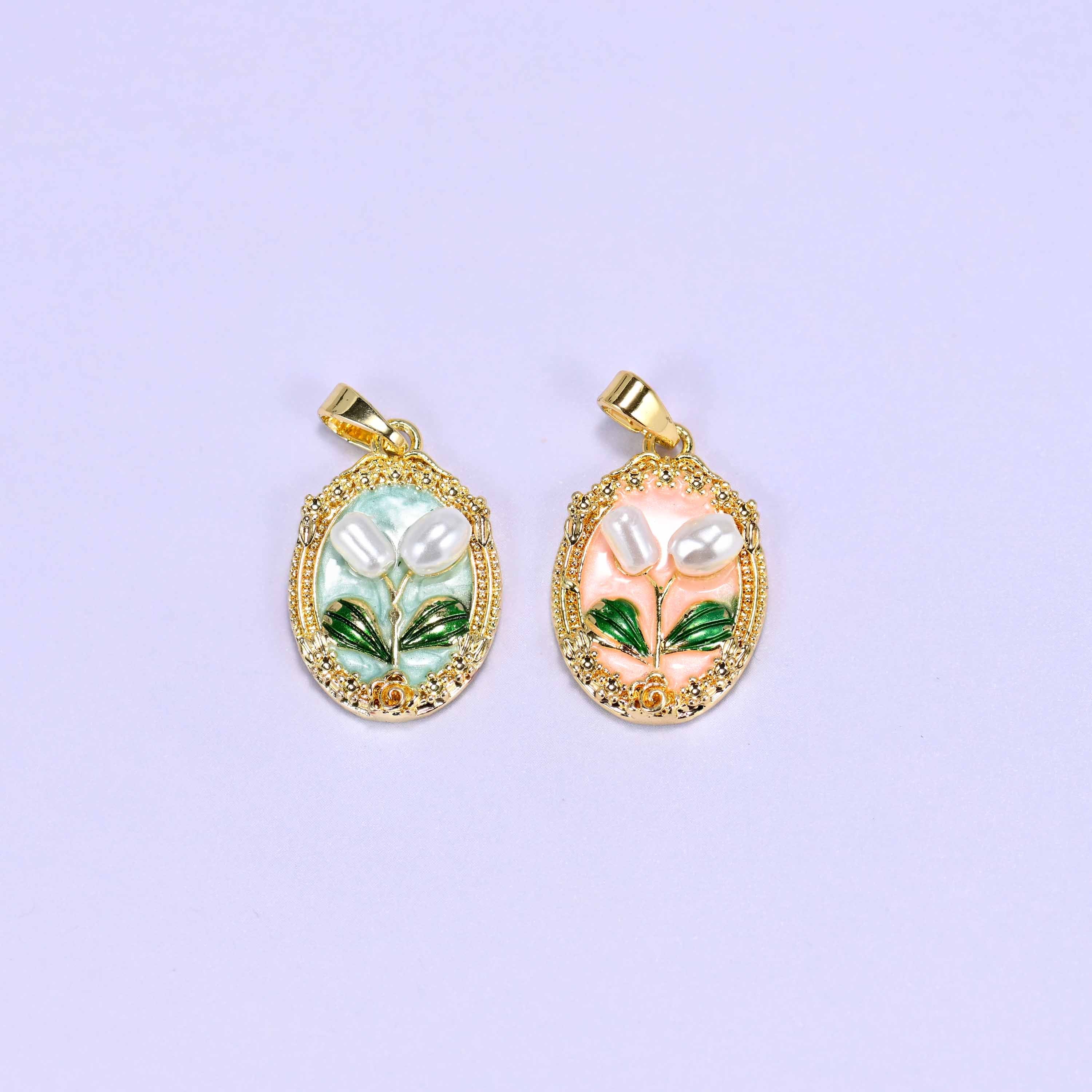 Enamel Oval Tulip Flower Pendants shown as both colours together, mint on the left and peach on the right, each with a small gold bail.