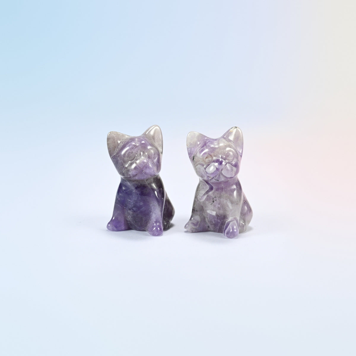 Two natural amethyst French bulldog crystal carvings, 1.5 inch, purple and white banded