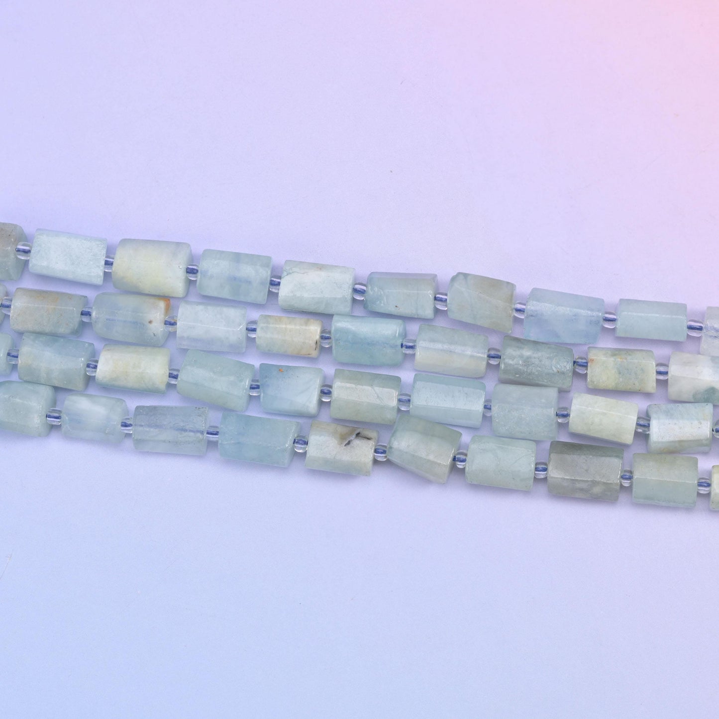 Blue Aquamarine Faceted Tube Beads in natural blue tones