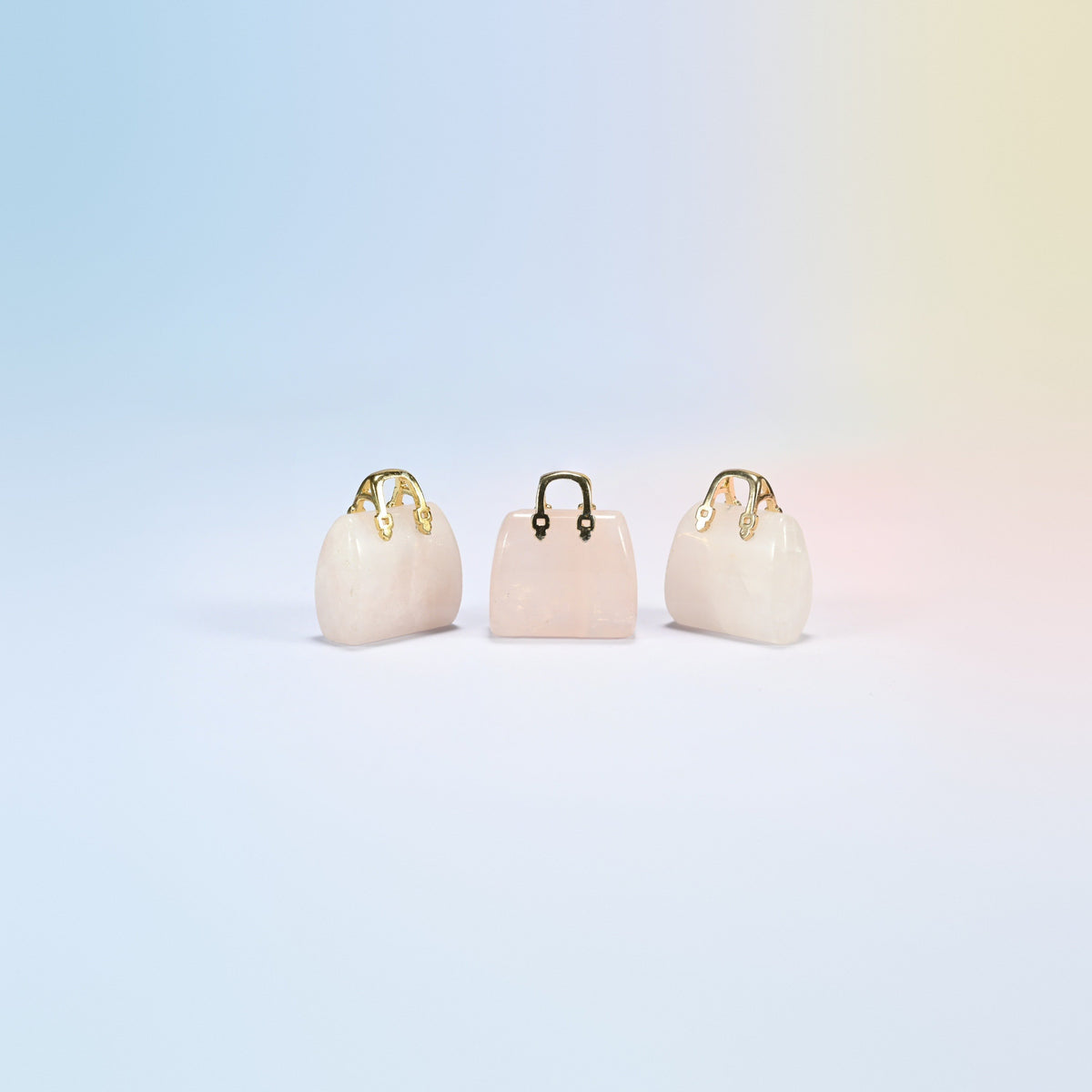 Three rose quartz purse crystal carvings, 1 inch, light pink natural stone, gold-tone handle