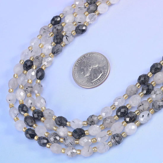 Black Rutilated Quartz Faceted Rice Barrel Beads 6x8mm in clear to frosted white with black needle inclusions