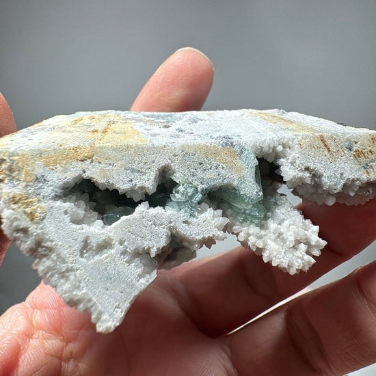 Underside view showing the hollow pocket running beneath the quartz plate