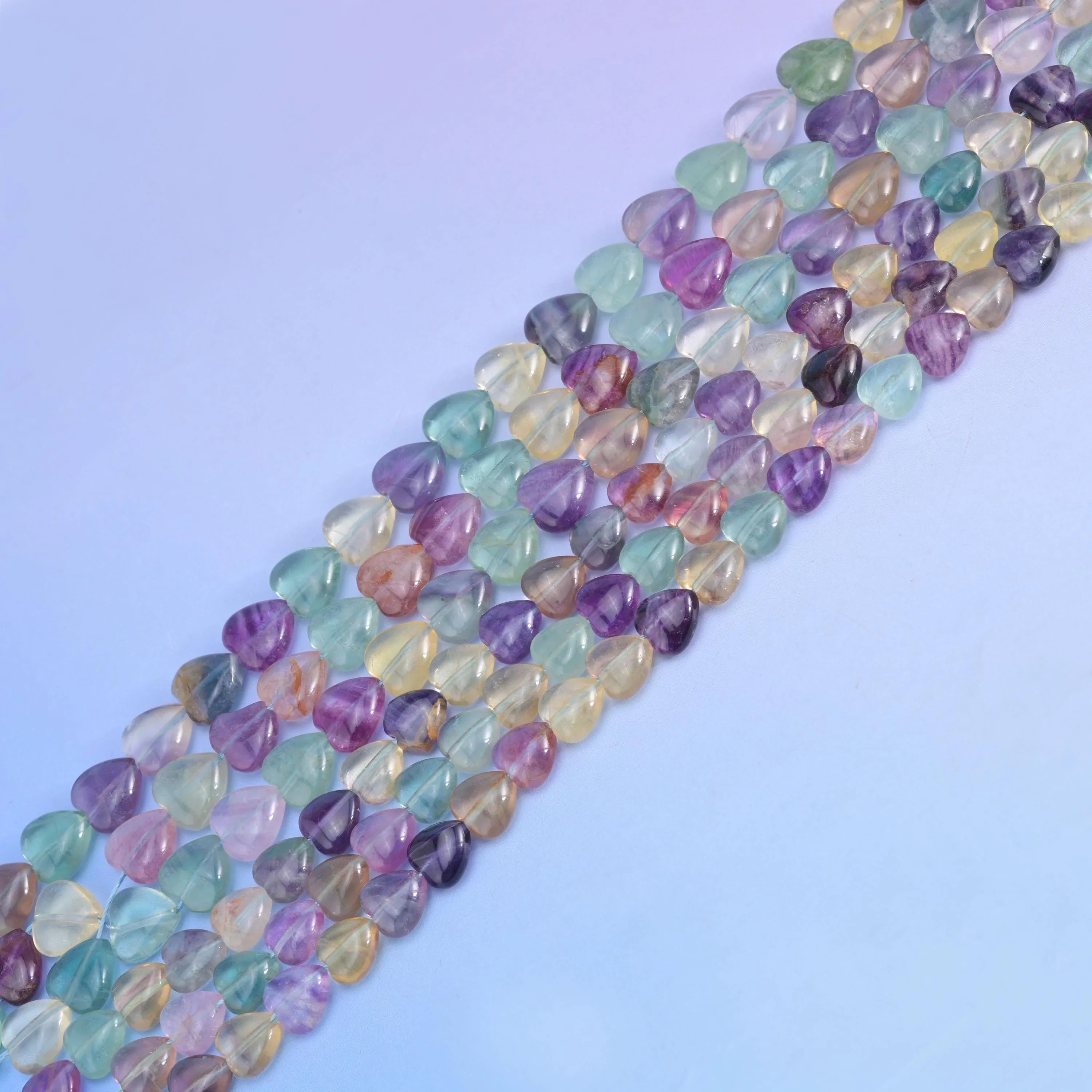 Rainbow Fluorite in mint green, lavender, deep violet and pale yellow.