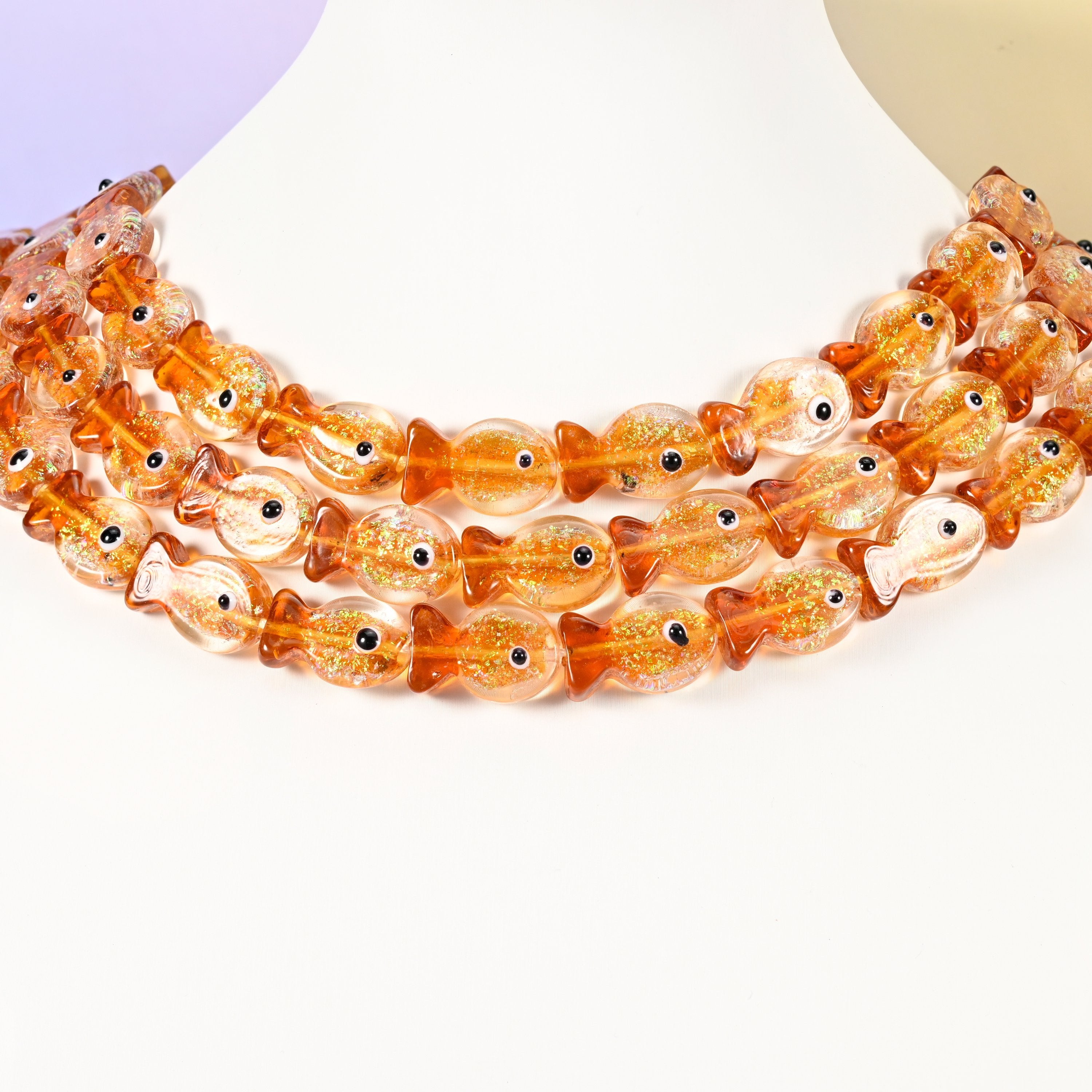 Orange fish glass beads, 19x12mm