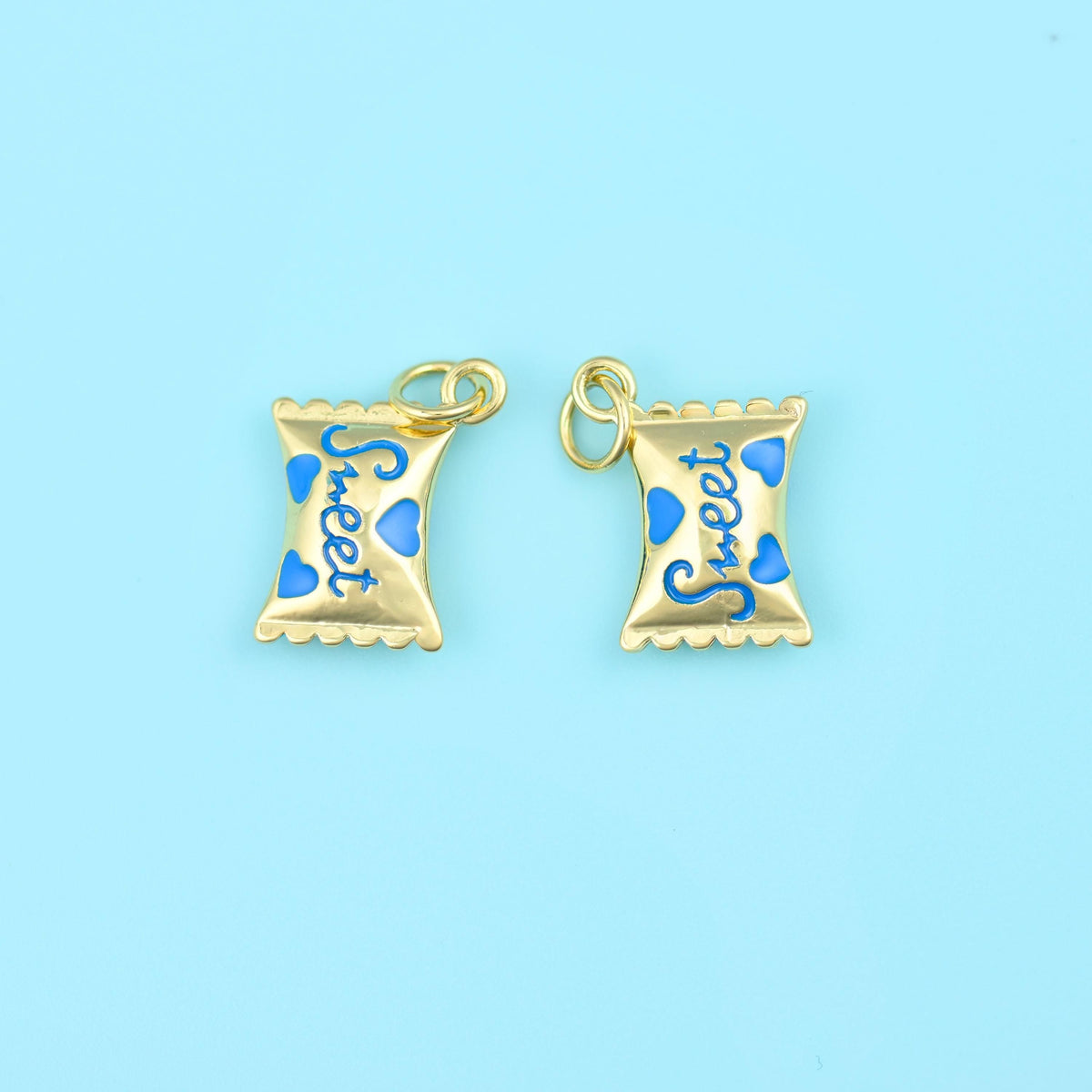 16mm enamel sweet candy charms with blue script and blue enamel hearts, two gold wrapped-sweet charms.
