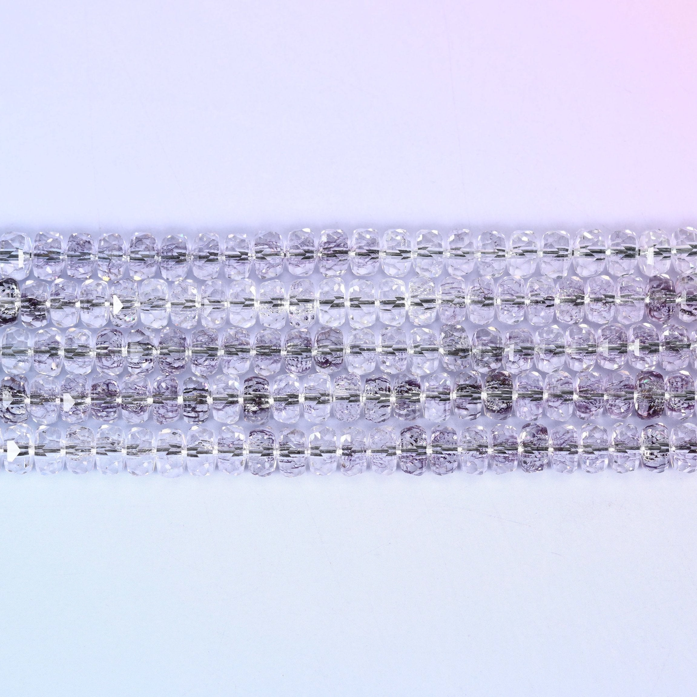 Transparent Light Purple Faceted Rondelle Glass Beads in pale smoky lilac