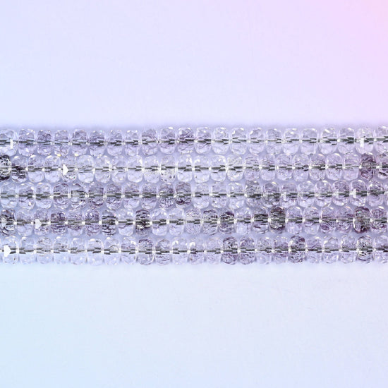 Transparent Light Purple Faceted Rondelle Glass Beads in pale smoky lilac