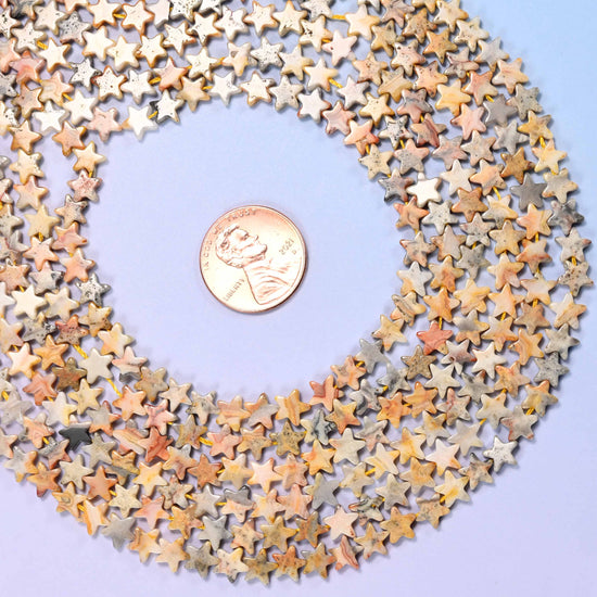 Crazy agate flat star beads, approximately 75 per strand