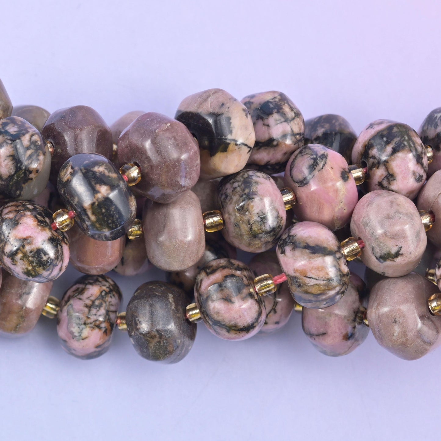 Rhodonite smooth pumpkin beads in soft pink with striking black matrix veining