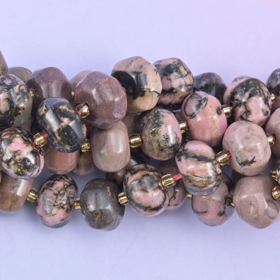 Rhodonite smooth pumpkin beads in soft pink with striking black matrix veining