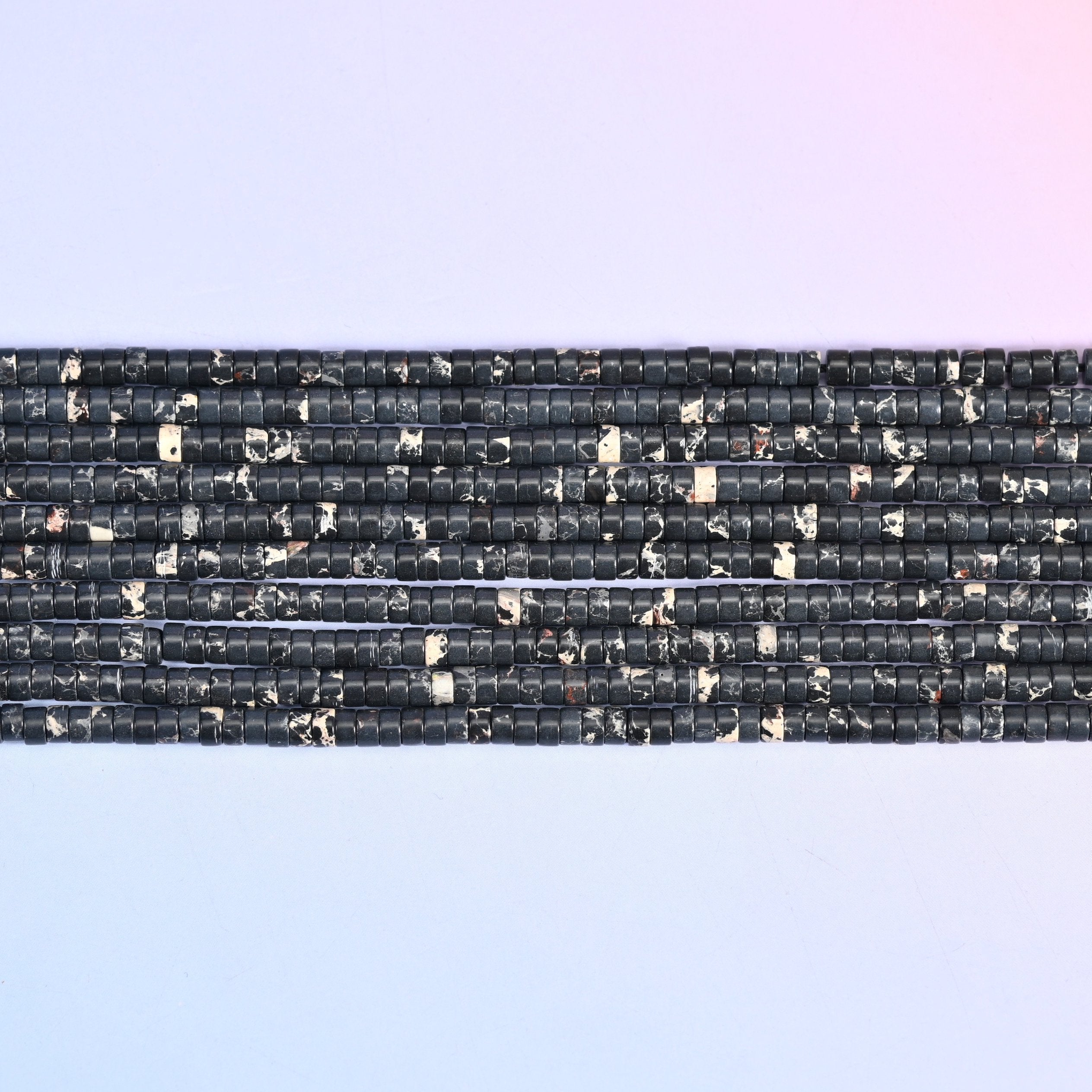 Black Sea Sediment Jasper Heishi Disc Beads 2x4mm in black with cream and white marbling