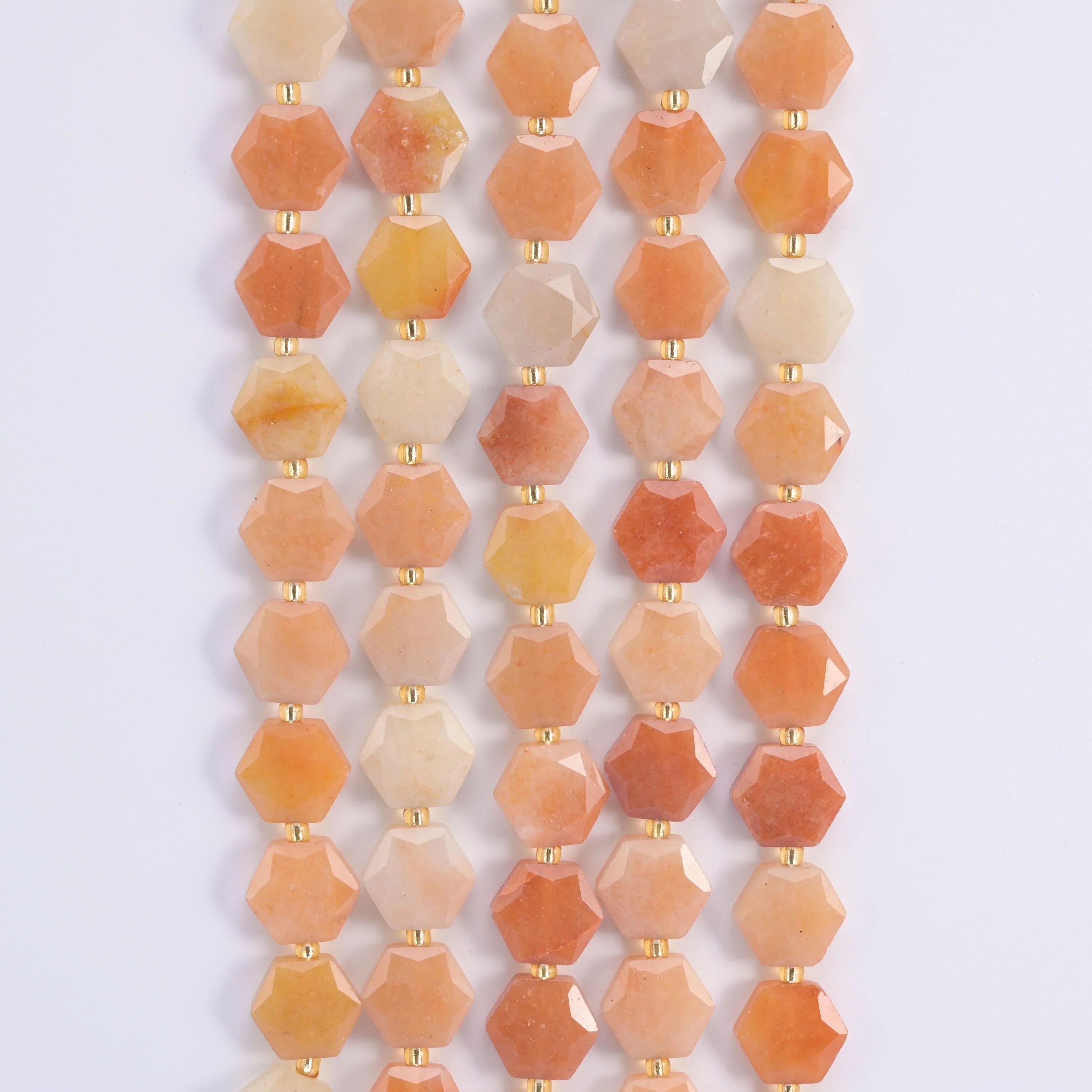 Gold Silk Jade hexagon beads, 15.5 inch strand.