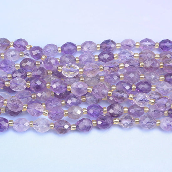Faceted rice barrel cut amethyst rutilated quartz beads