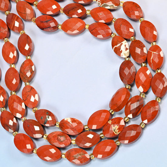 Flower red jasper faceted flat oval beads curved into an open loop, red stone with cream flower patches