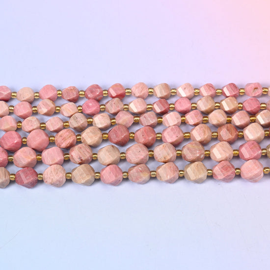 Pink Rhodonite in dusty rose and salmon pink marbled with cream and grey